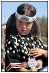 Continously rotating pictures of Native American culture.
