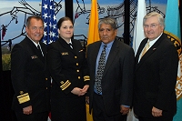 Left to Right: Dr. Charles Grim, LCDR Lori Moore, Jim Toya, and Robert McSwain