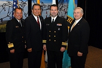 Left to Right: Dr. Charles Grim,   Mr. John Daugherty, Jr., CDR Brandon Taylor, and Robert McSwain