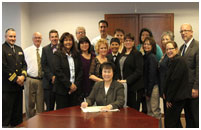 Thumbnail - clicking will open full size image - Dr. Roubideaux signing LMRC Charter