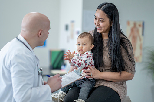 A doctor, a woman and a child