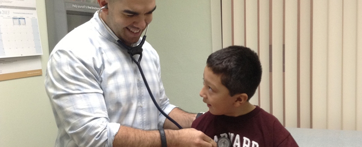 doctor treating child