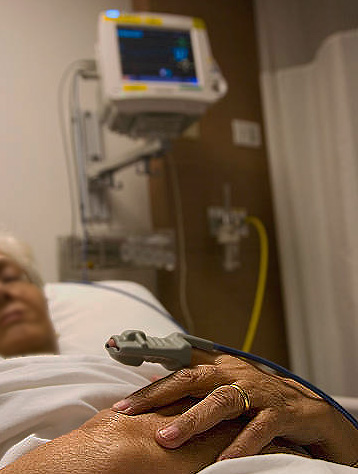 Elderly woman in an ER hospital bed