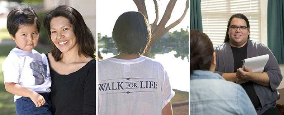 A mother holding her toddler daughter, a woman in a Walk for Life anti-suicide t-shirt, two women looking at the camera