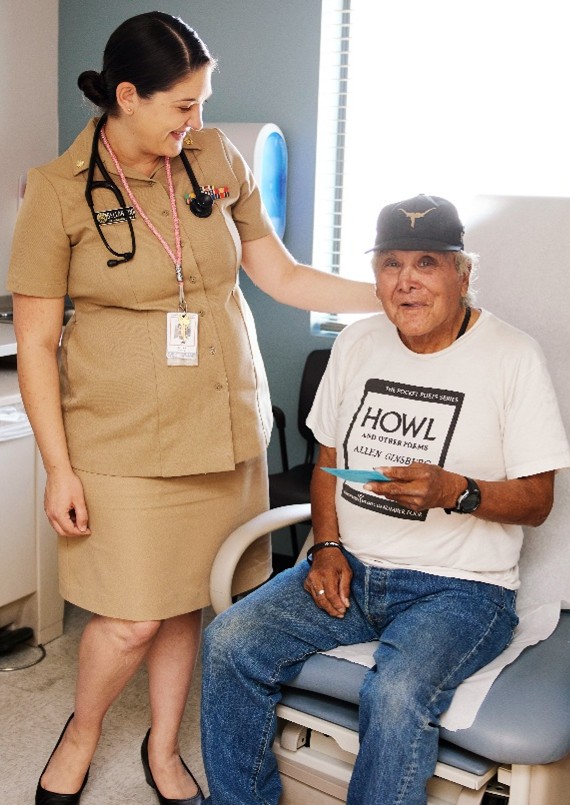 Provider visiting with patient