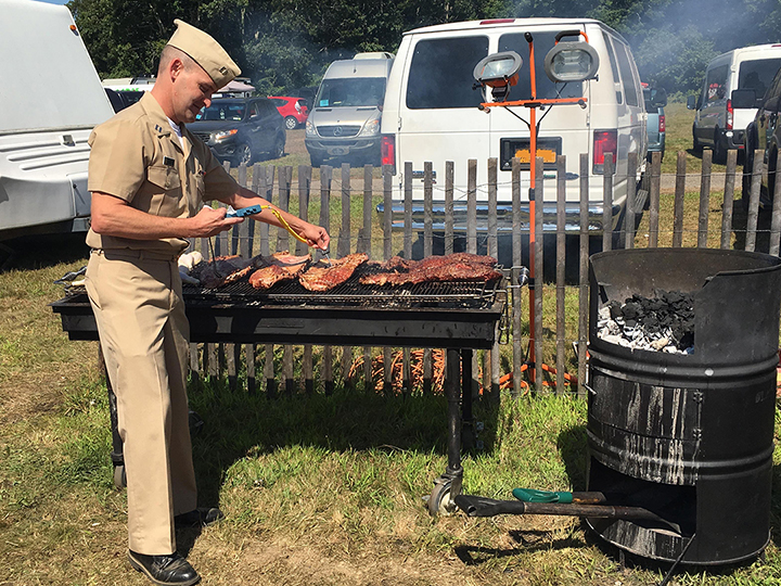 LT Riley Grinnell conducting a food safety survey of a temporary food vendor