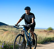 Joseph riding his mountain bike