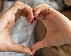 Two hands form a heart