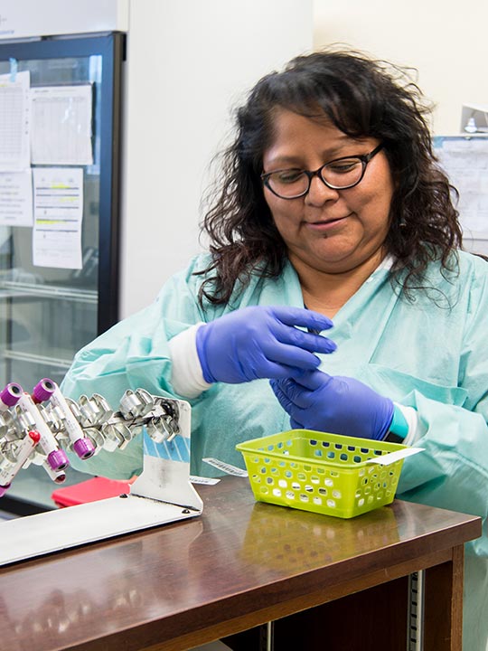 Female medial staff in a lab