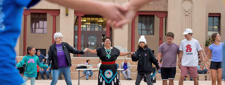 group of people holding hand