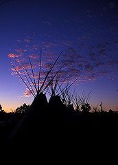 Teepees at sunset by Velonia Hardy