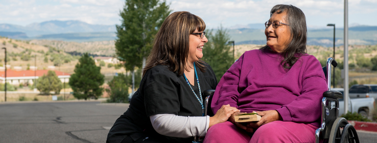 Nurse and patient in wheelchair
