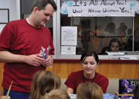 Children receive toothbrushes at a Catawba Service Unit Health Fair.