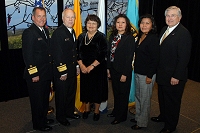 Left to Right: Dr. Charles Grim, Douglas Peter,  IHS Employees, and Robert McSwain