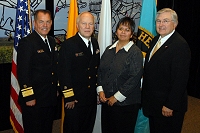 Left to Right: Dr. Charles Grim, Douglas Peter,  IHS Employee, and Robert McSwain