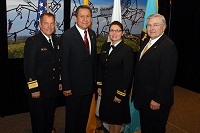 Left to Right: Dr. Charles Grim,   Mr. John Daugherty, Jr., LCDR Kelly Factor, and Robert McSwain