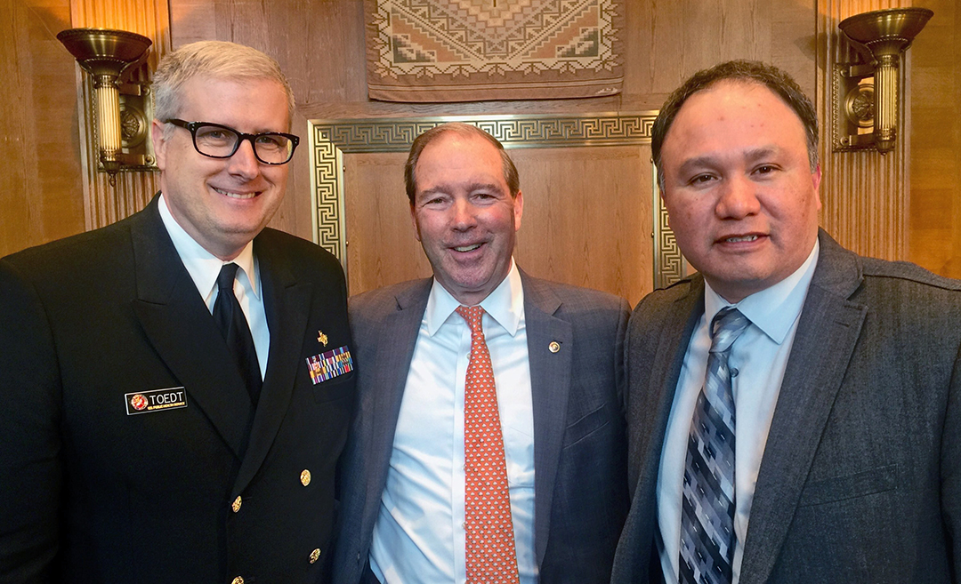 IHS Chief Medical Officer, Rear Adm. Michael Toedt, M.D.; Senator Tom Udall of New Mexico; and Samuel Moose, National Indian Health Board Treasurer and Bemidji Area Representative, pose for a picture after the hearing.