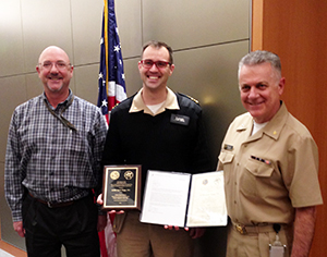 SFC 2016 Engineer of the Year: Presentation of the Sanitation Facilities Construction Program 2016 Engineer Award (L-R: Roger Slape, Navajo Area SFC Director, LCDR Ryan Clap, Navajo Area Senior Environmental Engineer and RADM Mark Calkins DSFC Director)