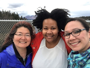 (From L to R) Pansy Alakayak, Behavioral Health Aide Practitioner, Minette Wilson, Public Health Advisor, and Alicia Ambrosio, Special Projects Coordinator in front of Lake Aleknagik in Dillingham, AK.
