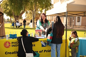 ACA outreach booth with information on From Coverage to Care.