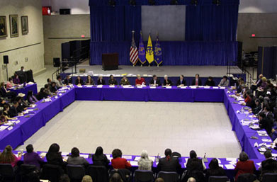 Tribal officials sitting at table