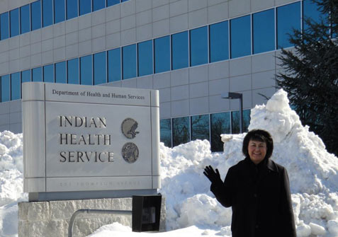 Dr. Roubideaux standing in front of IHS Headquarters