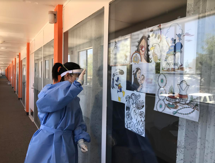 IHS Internal Medicine Chief Clinical Consultant Dr. Jennie Wei visiting patients at a hotel isolation site in Gallup, New Mexico