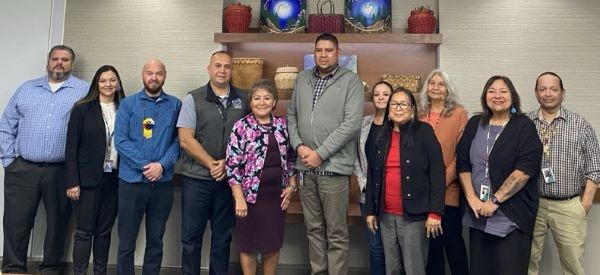 Director Roselyn Tso visit the Gun Lake Tribal Health Center and receiving a talking stick and feather