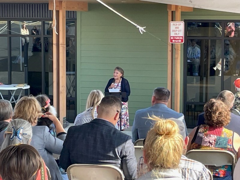 Ms. Tso speaking at the grand opening ceremony of the Leo Pocha Memorial Clinic