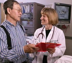 A patient gets more information about a colonoscopy from his provider at the Alaska Native Medical Center. Photo is courtesy of the Alaska Native Tribal Health Consortium.