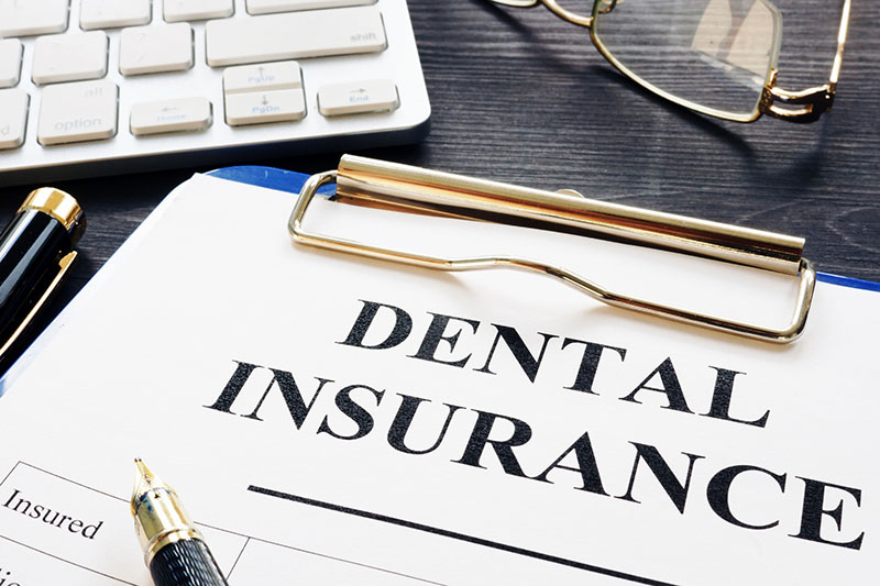 Medical cards for Health Insurance and Dental Care on a medical report.