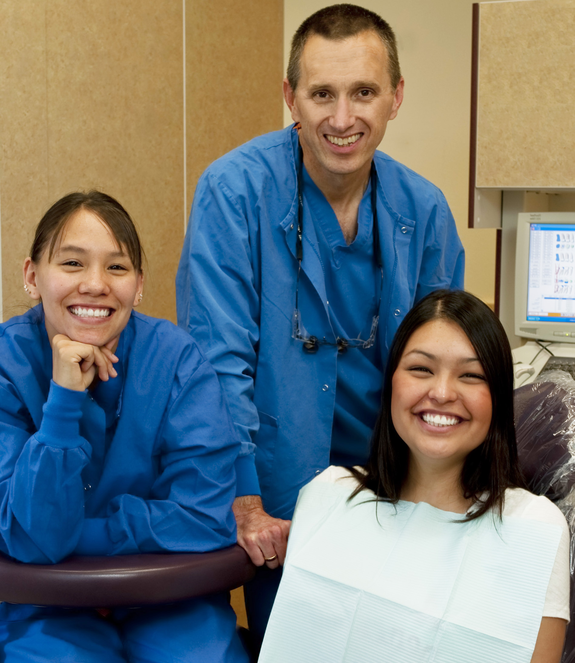 Dental workers and a patient