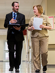 Image of woman and man having a conversation.