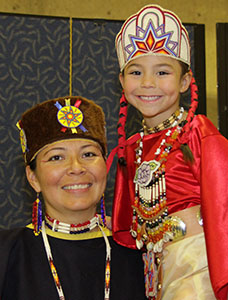 Photo of a mother and child in native clothing
