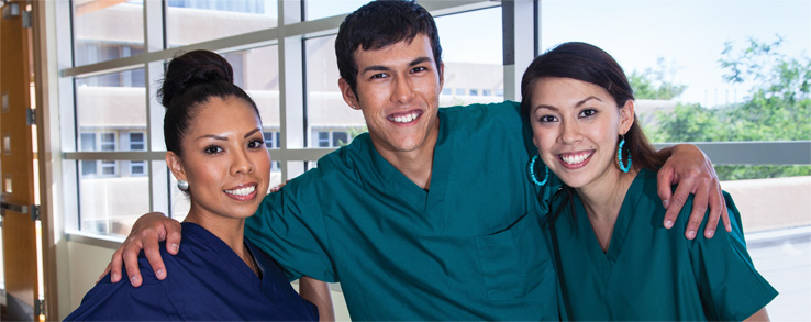 Three nurses smiling