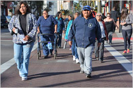 Native group walking in downtown Tucson.