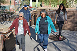 Native walkers climbing steps.