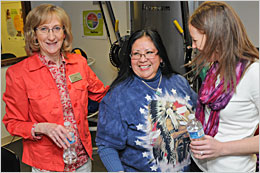 DIHFS staff members talking to a client.