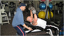 White Earth Diabetes Program member lifting weights.