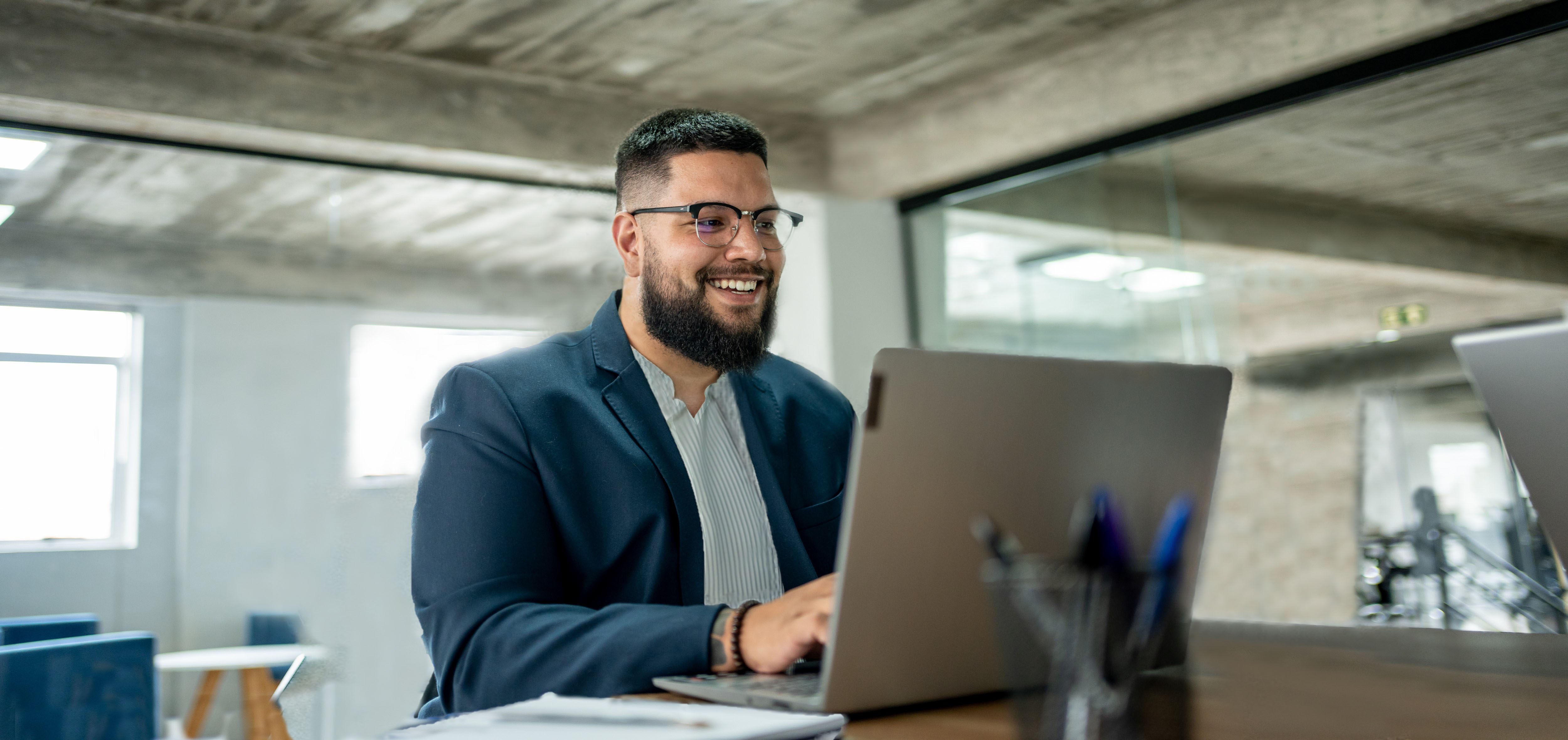 Man watching webinar in office