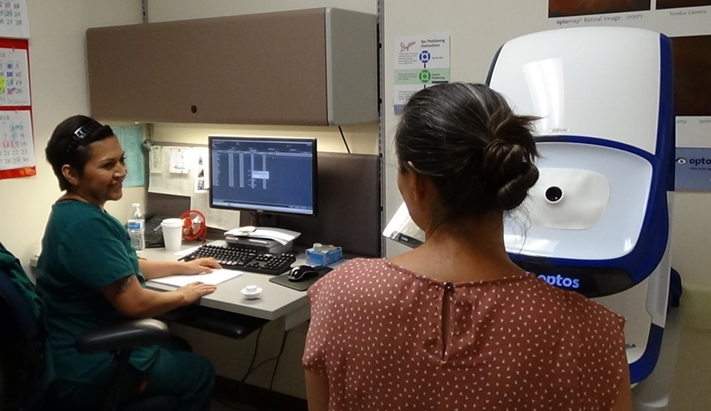 patient receiving an eye exam from doctor